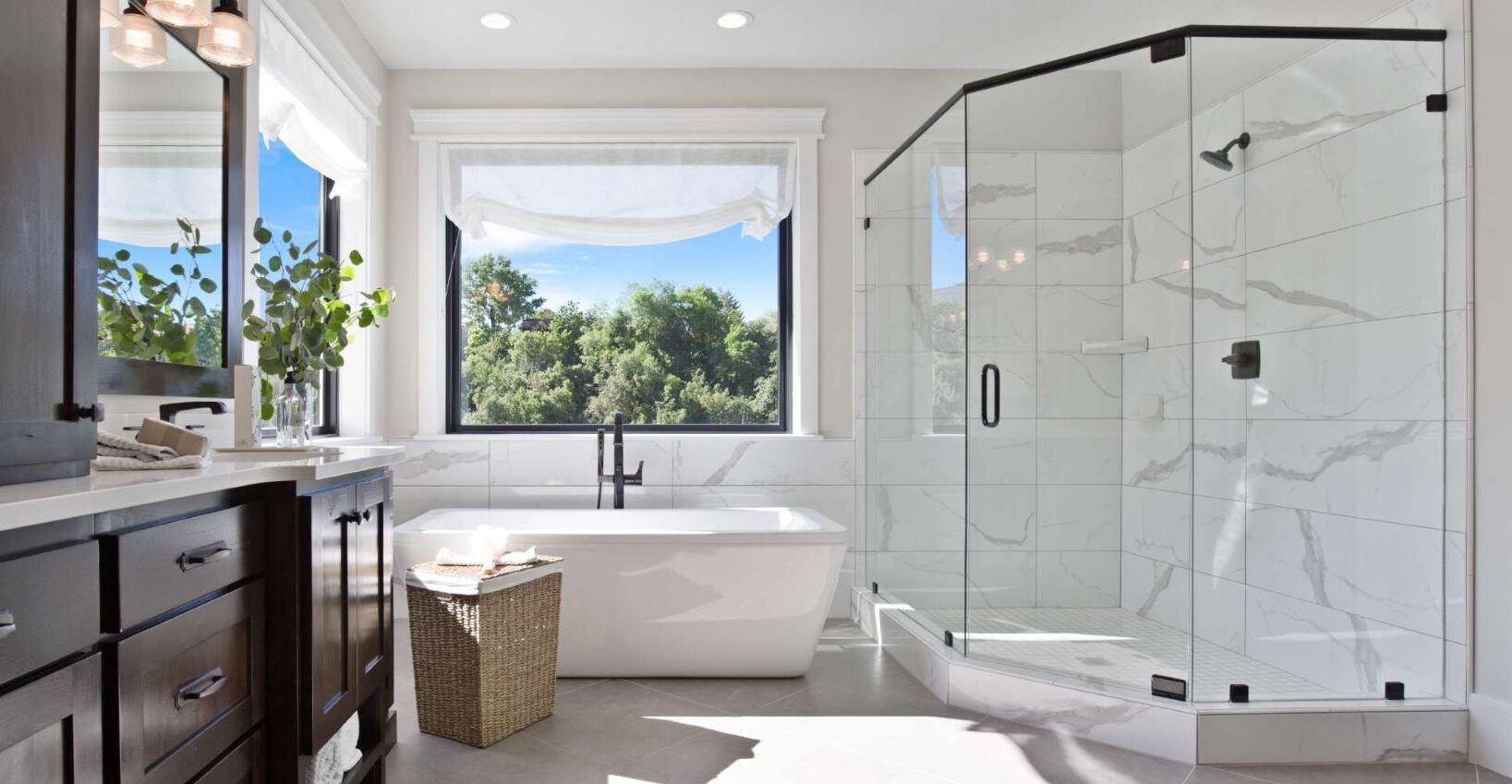 Bright bathroom with custom glass shower enclosure