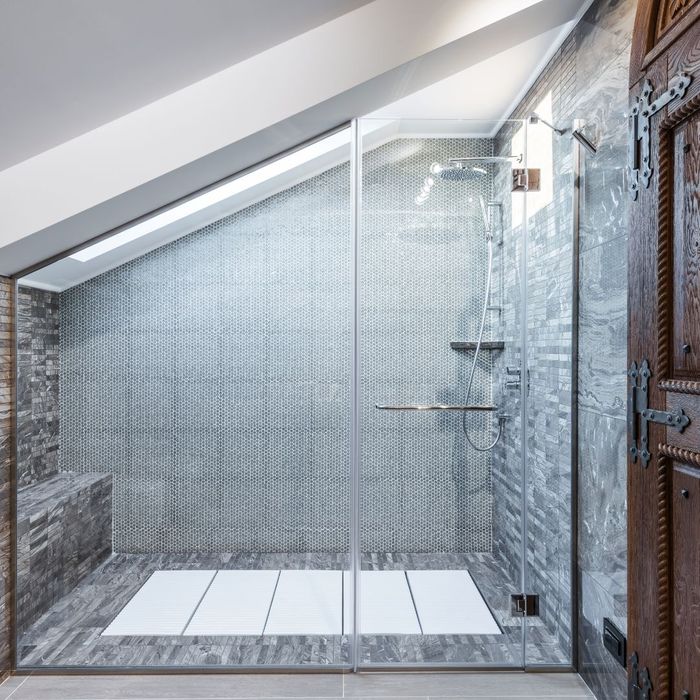 Custom angled glass shower enclosure