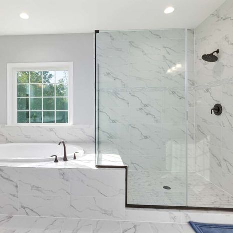 Semi frameless shower enclosure