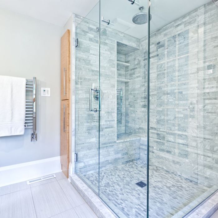 Tall view of frameless shower enclosure